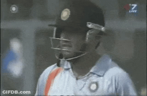 A Man Wearing A Helmet And A Shirt With The Number 7 On It GIF