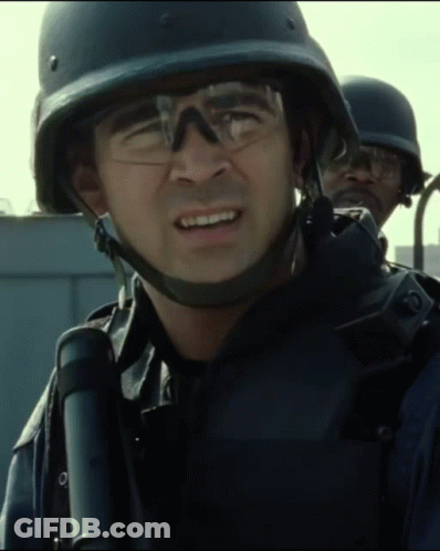 A Man Wearing A Helmet And Glasses Holds A Binoculars GIF