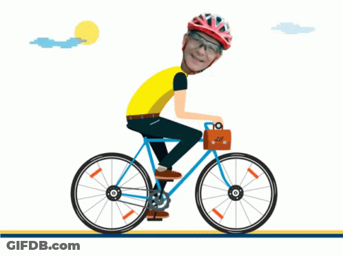 A Man Wearing A Helmet And Goggles Is Riding A Bike With A Briefcase On The Front GIF