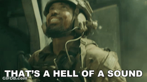 A Man Wearing A Helmet And Headphones With The Words That 'S A Hell Of A Sound Below Him GIF