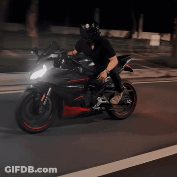 Man Wearing Helmet Riding Motorcycle GIF
