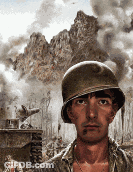 A Man Wearing A Helmet Stands In Front Of A Mountain With Smoke Coming Out Of It GIF