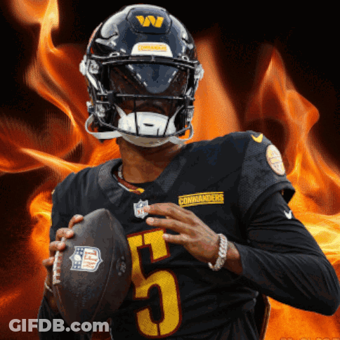 A Man Wearing A Helmet With The Number 5 On It GIF