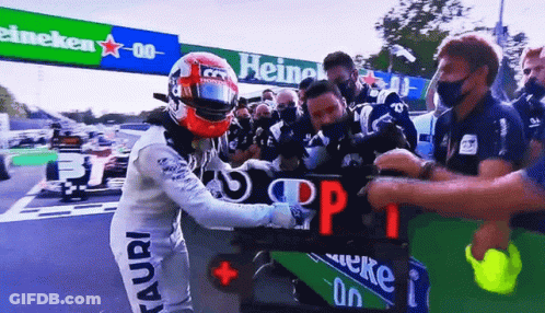 A Man Wearing A Helmet With The Word Tauri On His Pants GIF
