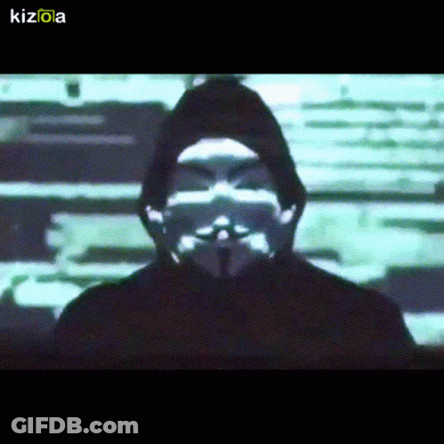 A Man Wearing A Hooded Jacket And A Mask With The Letters Kizola On The Bottom GIF