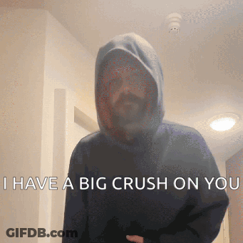 A Man Wearing A Hooded Sweatshirt Says " I Have A Big Crush On You " GIF