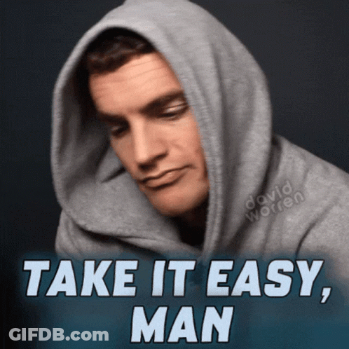 A Man Wearing A Hooded Sweatshirt With The Words Take It Easy Man Below Him GIF