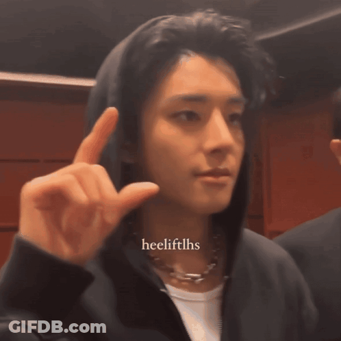 A Man Wearing A Hoodie And A Necklace Has The Hashtag Heelliftlhs On The Bottom Right GIF