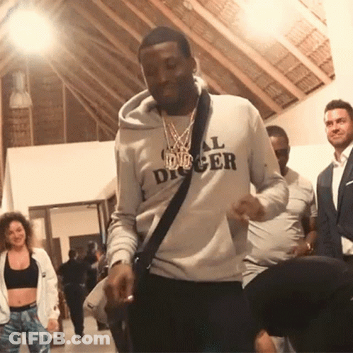 A Man Wearing A Hoodie That Says All Digger Is Dancing GIF