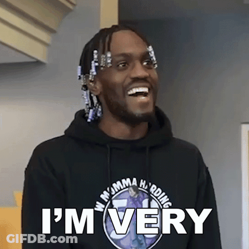 A Man Wearing A Hoodie That Says I 'M Very Is Smiling GIF