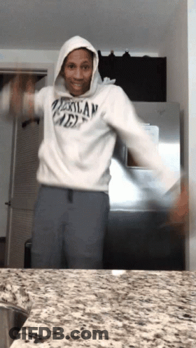 A Man Wearing A Hoodie That Says Mexican Mex Is Dancing GIF
