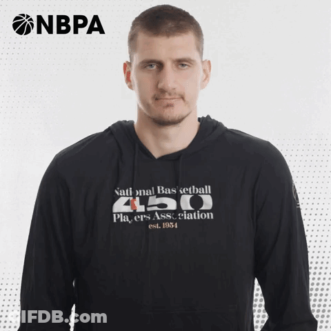 A Man Wearing A Hoodie That Says National Basketball 450 On It GIF