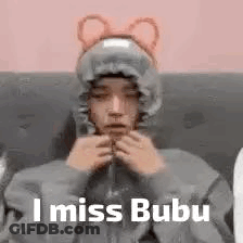 A Man Wearing A Hoodie With Ears And The Words `` I Miss Bubu '' . GIF