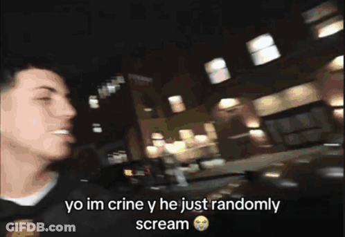 A Man Wearing A Hoodie With The Letter C On It GIF