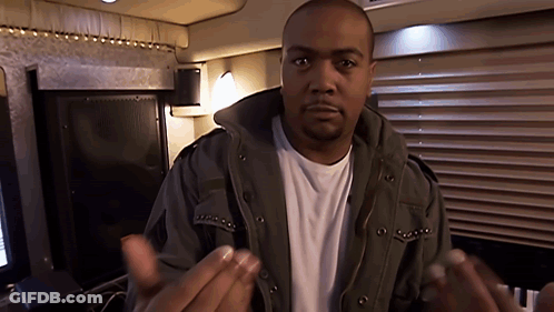 A Man Wearing A Jacket And A White Shirt Is Talking GIF