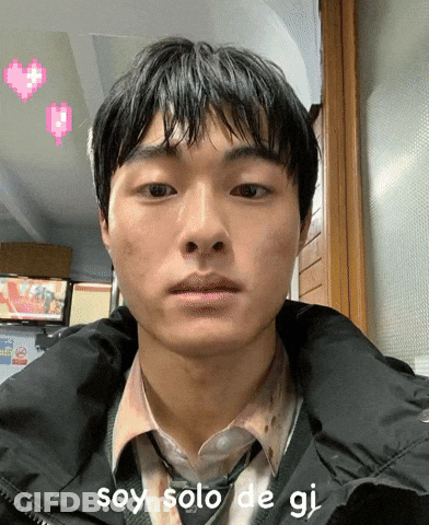 A Man Wearing A Jacket And Tie With The Words Soy Solo De Gi On His Face GIF