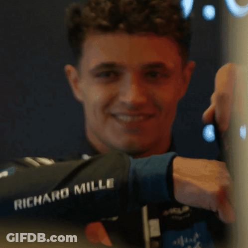 A Man Wearing A Jacket That Says Richard Mille GIF