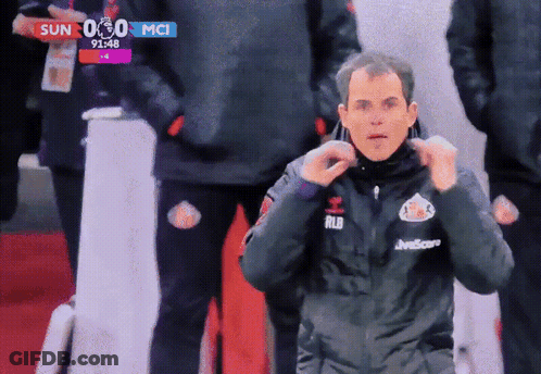 A Man Wearing A Jacket That Says Rld On The Front GIF