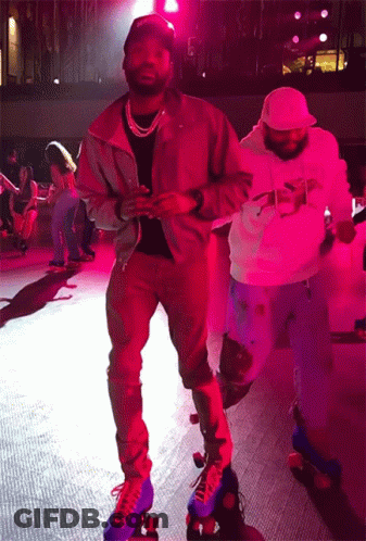 A Man Wearing A Jacket That Says Supreme Is Rollerblading On A Rink GIF