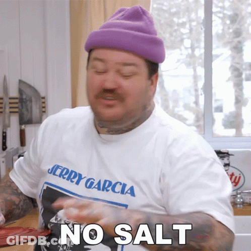 A Man Wearing A Jerry Garcia Shirt Says " No Salt " GIF