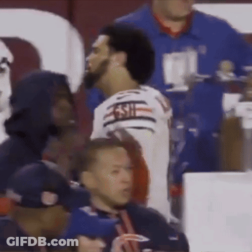 A Man Wearing A Jersey That Says 49Ers Is Talking To Another Man GIF