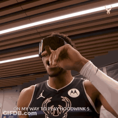 A Man Wearing A Jersey That Says Hoodwink 5 GIF