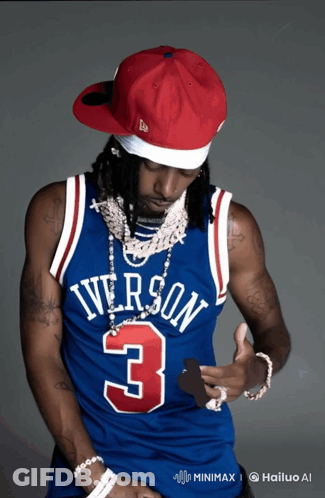 A Man Wearing A Jersey That Says Iverson 3 On It GIF