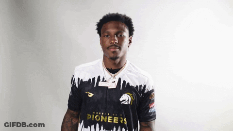 A Man Wearing A Jersey That Says Pioneers GIF