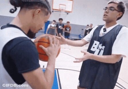 A Man Wearing A Jersey With The Letter B On It Is Holding A Basketball GIF