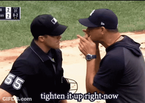 A Man Wearing A Jersey With The Number 55 Talks To Another Man GIF