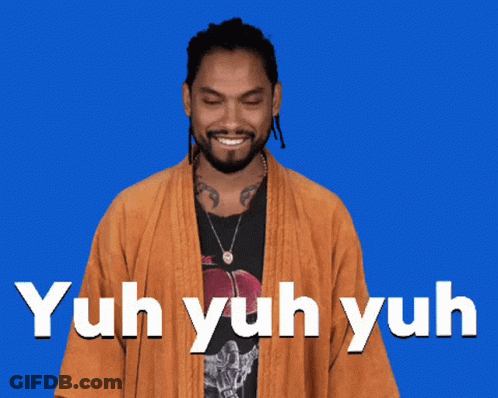A Man Wearing A Kimono And A Black Shirt Says Yuh Yuh Yuh On A Blue Background GIF