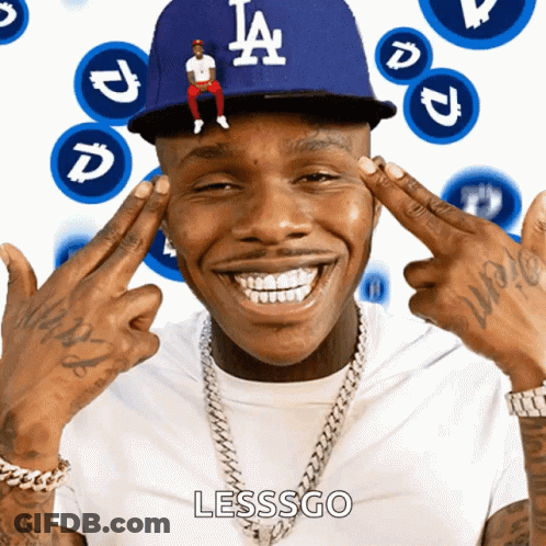 A Man Wearing A La Dodgers Hat Is Smiling With His Hands On His Forehead GIF