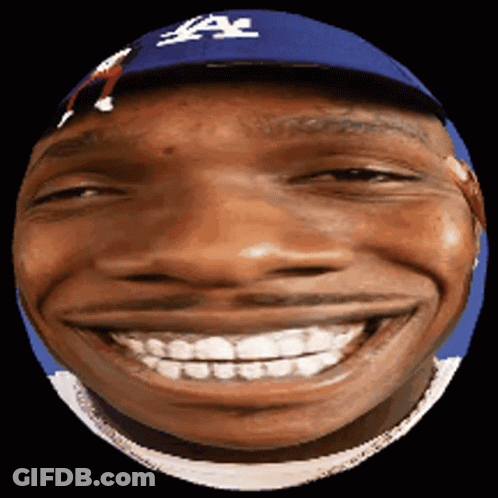 A Man Wearing A La Dodgers Hat Smiles With His Mouth Wide Open GIF