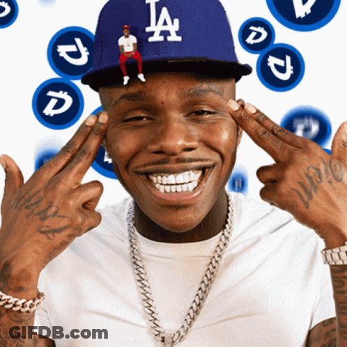 A Man Wearing A La Hat Holds His Hands To His Face GIF