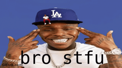 A Man Wearing A La Hat With A Man Sitting On Top Of It GIF