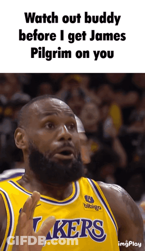 A Man Wearing A Lakers Jersey Is Making A Funny Face GIF