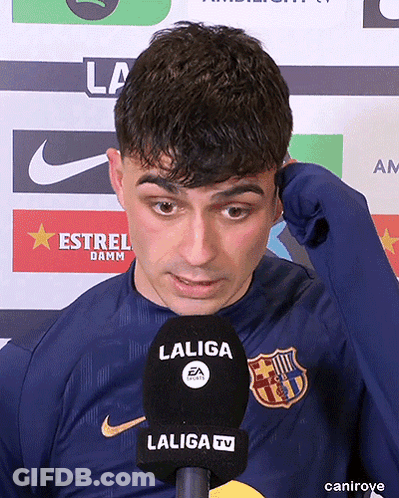 A Man Wearing A Laliga Shirt Talks Into A Laliga Microphone GIF