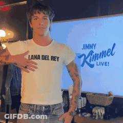 A Man Wearing A Lana Del Rey T-Shirt Stands In Front Of Jimmy Kimmel Live GIF