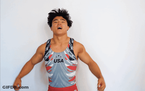 A Man Wearing A Leotard That Says Usa On The Front GIF