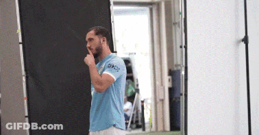 A Man Wearing A Light Blue Shirt With The Word Oni On The Sleeve GIF
