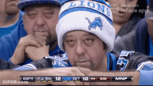 Man In Lions Hat Watching Game GIF