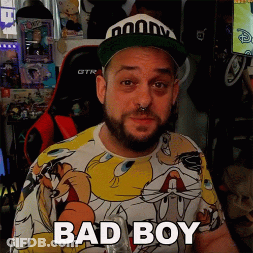 A Man Wearing A Looney Tunes Shirt Says " Bad Boy " GIF