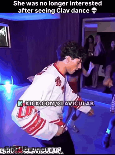 A Man Wearing A Los Angeles Jersey Is Dancing GIF