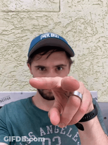 A Man Wearing A Los Angeles Shirt And A New Era Hat GIF