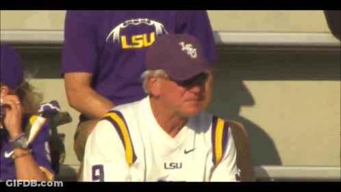 A Man Wearing A Lsu Jersey And Hat GIF