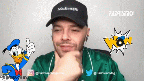 A Man Wearing A Madhappy Hat With Donald Duck In The Background GIF