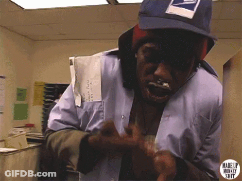A Man Wearing A Mailman 'S Hat Has A Sticker That Says Made Up Monkey Shit On It GIF