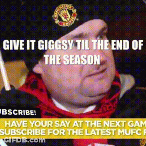 A Man Wearing A Manchester United Hat Is Holding A Stick GIF