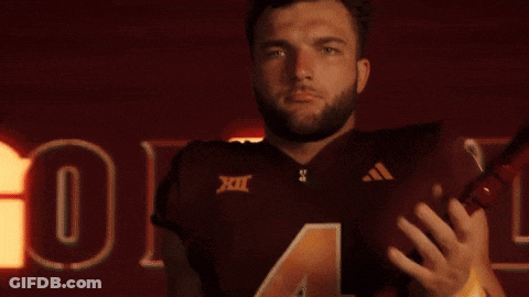 A Man Wearing A Maroon Jersey With The Number Four On It GIF