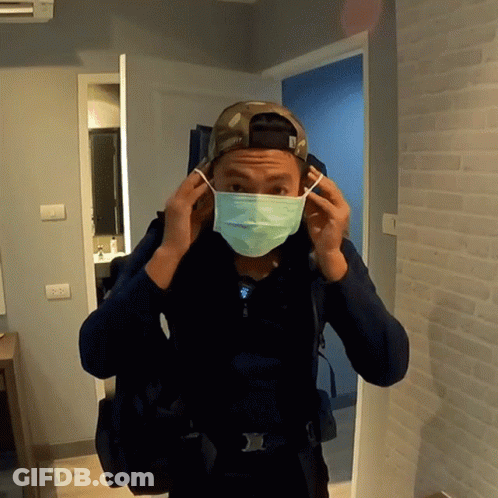 A Man Wearing A Mask And A Hat That Says Army GIF